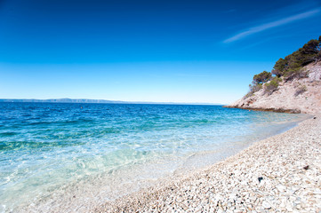 Fototapeta na wymiar View of Adriatic Sea and quiet majestic bay with beach