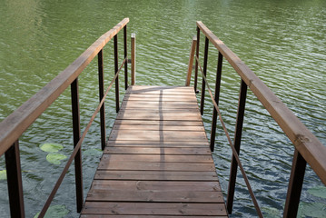 wooden gangway on the lake