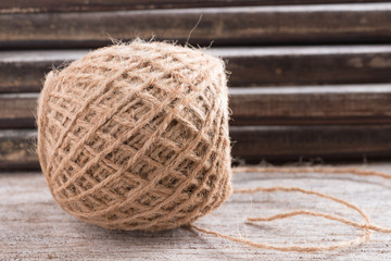 Hemp rope on wood background