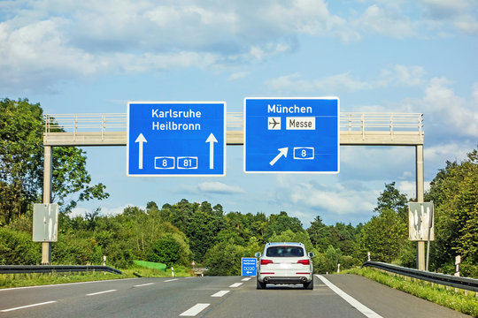 freeway road sign on Autobahn A81, Karlsruhe / Heilbronn - exit Munich / Airport / Mess