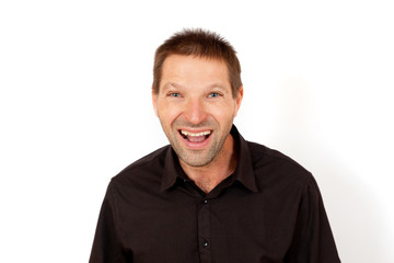 The young man having fun laughing