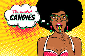 Wow female face. Sexy african american girl in glasses with afro hair, open mouth, bright lollipop in her hand and The sweetest Candies speech bubble. Vector background in pop art retro comic style. - 170821029