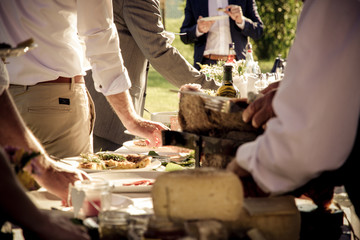 a table of Tuscan starters with guests