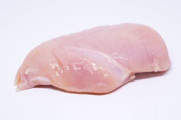 Raw chicken breast fillets on white background