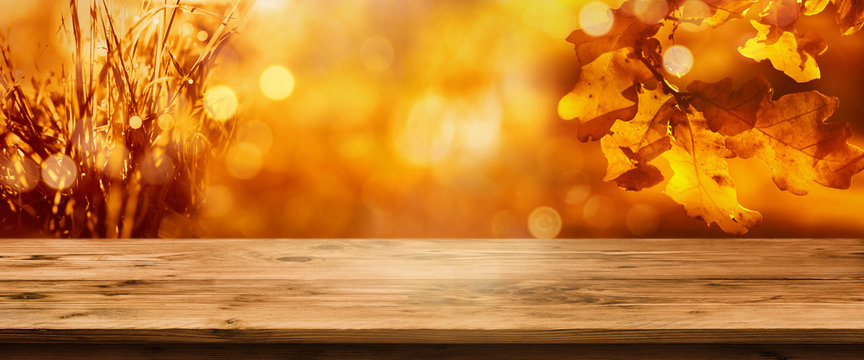 Radiant autumn background with table