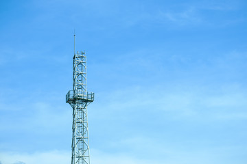 Communications tower with nice blue sky background