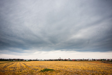 Cloudy skies over empty fields in Gorcko, Slovenia.