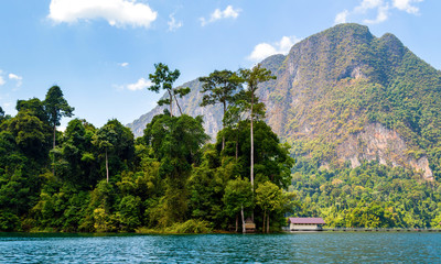 Beautiful mountains lake river sky and natural attractions in Ratchaprapha Dam at Khao Sok National Park, Surat Thani Province, Thailand