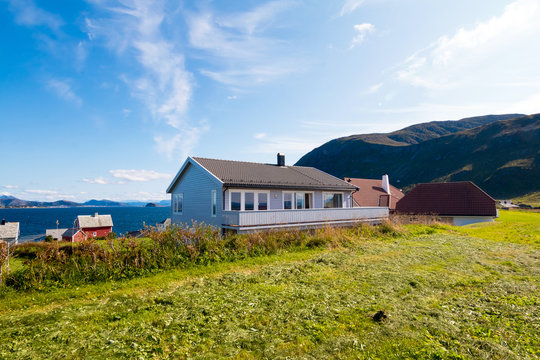 A norwegian cottage. Hill in background. Beautiful landscape. Norway