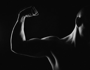 Obraz na płótnie Canvas bodybuilder on black background