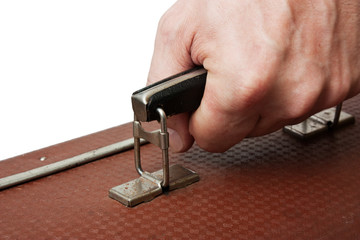 old suitcase in hand