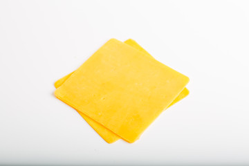 Cheddar cheese slices close up