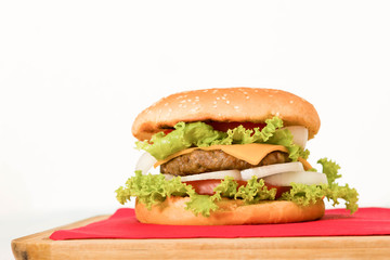 home made hamburger on red napkin