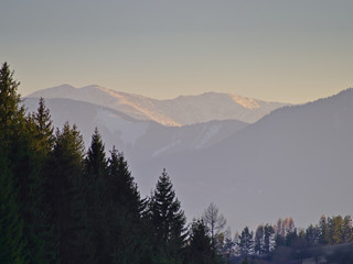 Beautiful view over valley with fields and forest. Tatra mountains, Slovakia.