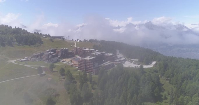 Thyon frontal traveling in clouds - Aerial 4K - Phantom 4 PRO
