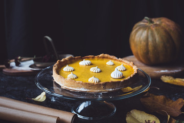 pumpkin pie on cake stand