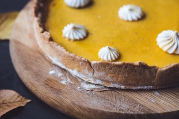 pumpkin pie on chopping block