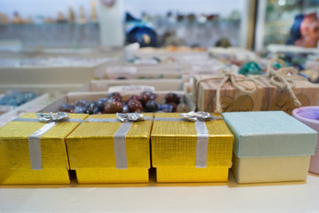 Small golden gift boxes on the counter store