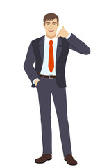 Fototapeta premium Businessman with hand in pocket showing a call me sign