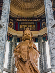 The golden statue of Quan Yin, the Chinese god of mercy.