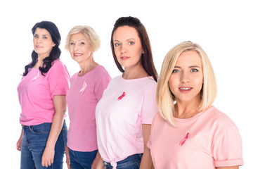 women in pink t-shirts with ribbons