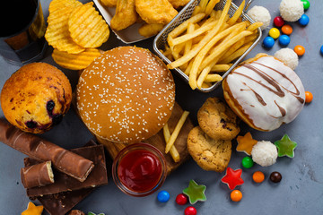 Assortment of unhealthy products that's bad for figure, skin, heart and teeth. Fast carbohydrates...