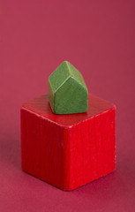 Holzklötze als Symbofoto für Mieten/Immobilien