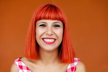 Red haired woman with red checkered dress