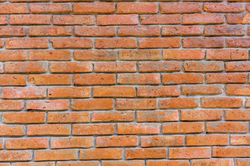 Red old grunge brick wall for background