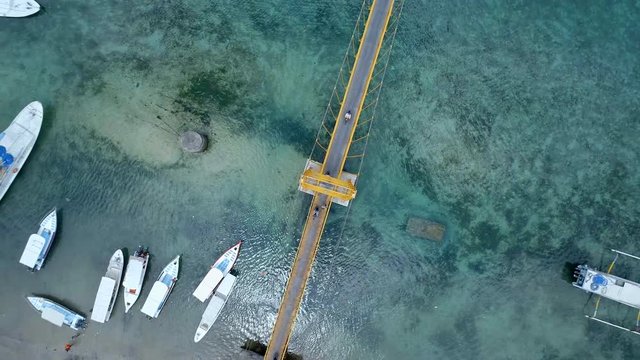 Bird's Eye View of the Yellow Bridge Connecting the Islands of Nusa Ceningan and Lembongan in Bali