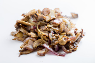 close up of fried sliced mushrooms and onions