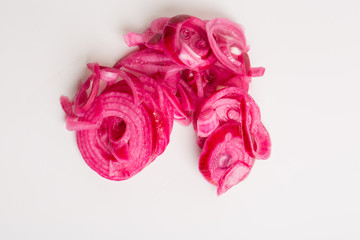 close up of sliced pickled onion rings