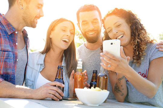 Group of friends having fun taking selfie pictures