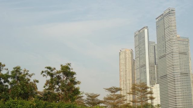 day time hong kong kowloon icc building cityscape walking panorama 4k china