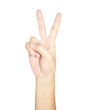 Closeup of female hand showing victory sign isolated on white background. Young woman shows 2 fingers, clipping path