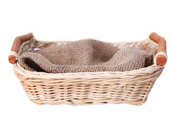 Obraz premium Empty basket with cloth isolated.