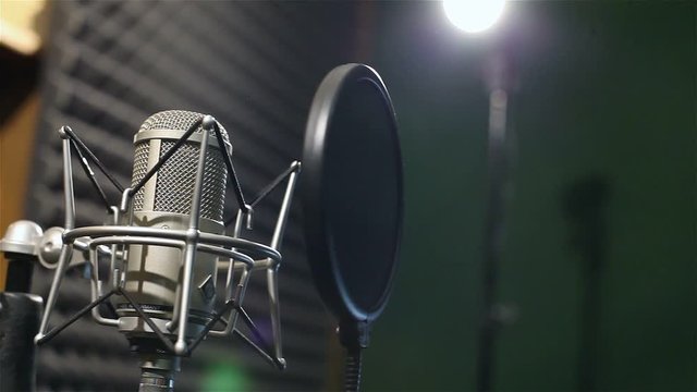 Studio recording, professional microphone in the recording studio, close up