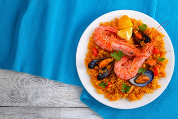 portion of tasty seafood valencia paella