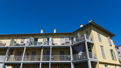 Balcony of apartment with blue sky