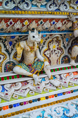 Obraz premium High Relief Sculpture of animal and monster decorated with ceramic, Wat Pariwat Temple,Bangkok,Thailand