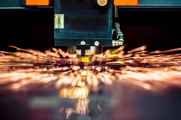 CNC Laser cutting of metal, modern industrial technology.