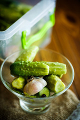 Pickled cucumbers in a glass bowl