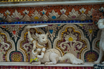 Fototapeta na wymiar Traditional Thai style sculptures and painting of monster,animals and gods in church under decoration of Wat Pariwat