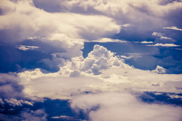 Fototapeta na wymiar Cumulus clouds seen from high altitude