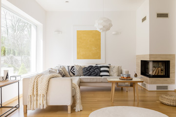 Wooden table next to fireplace
