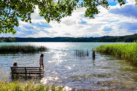 "A beautiful seat on a bench in the lake of Buckow in the Märkische Schweiz at Schermützelsee. "