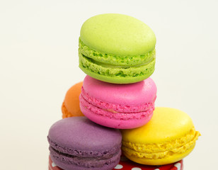 Close up colorful macarons dessert with vintage pastel tones