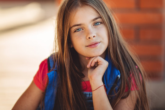 Portrait of cute pretty girl is wearing autumn fashion clothes