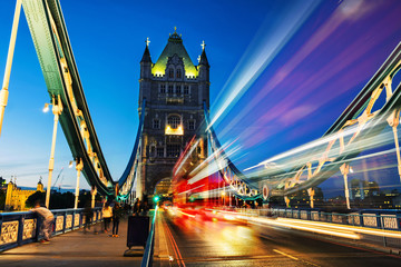 Fototapeta na wymiar Car traffic at Tower bridge at night in London, UK