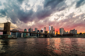 View of Manhattan bridge and Manhattan in New York, USA at sunset